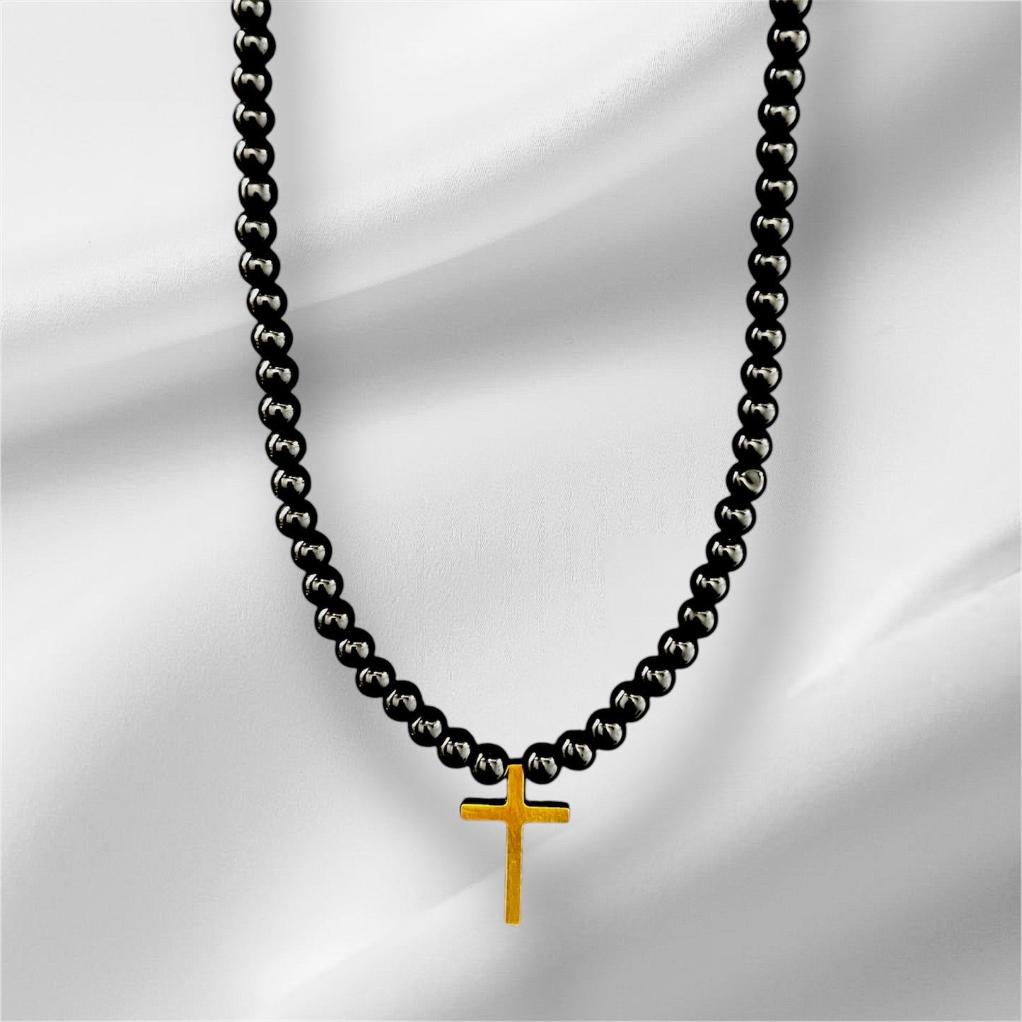 Perlas Black Cruz Dorada