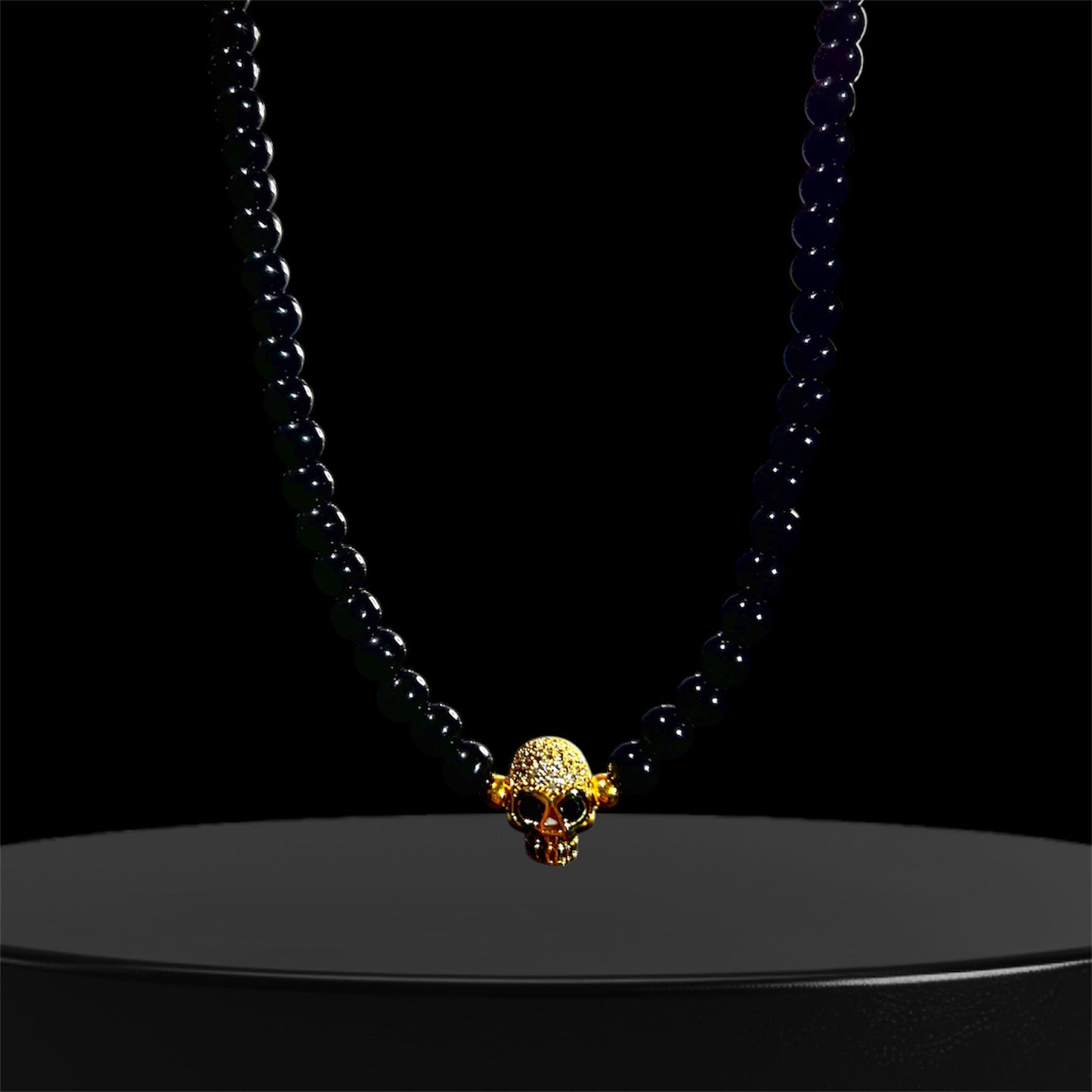 Perlas Black Calavera Gold