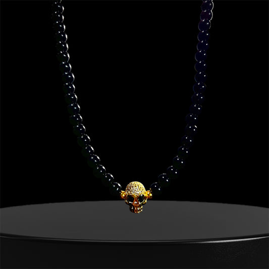 Perlas Black Calavera Gold
