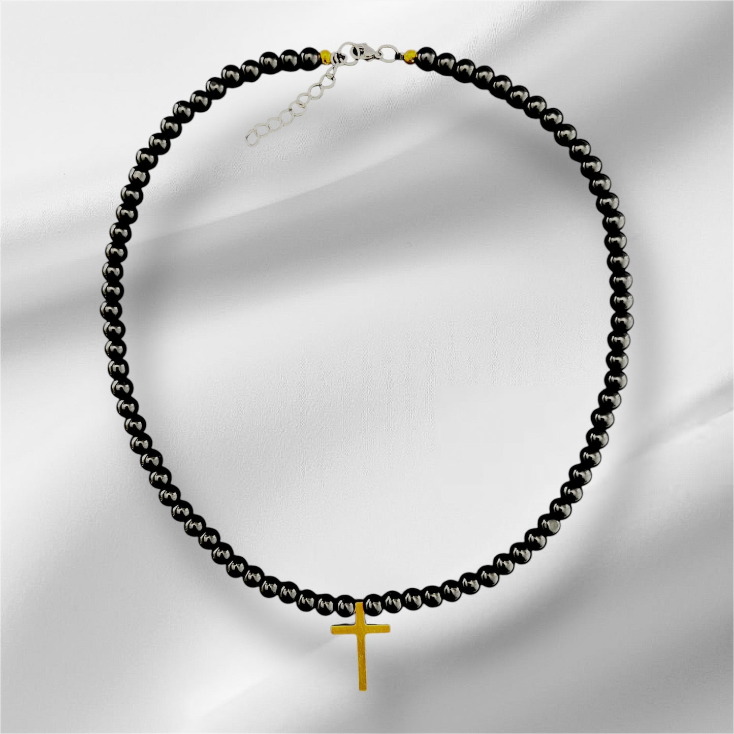 Perlas Black Cruz Dorada