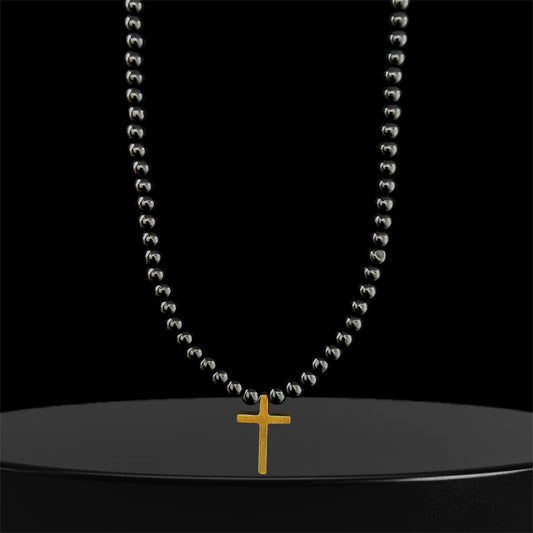 Perlas Black Cruz Dorada